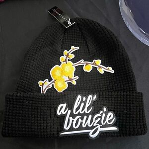 Black beanie with A LIL’ BOUGIE patch and yellow flowers